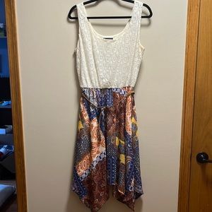 Handkerchief sleeveless midi length summer/falls dress.